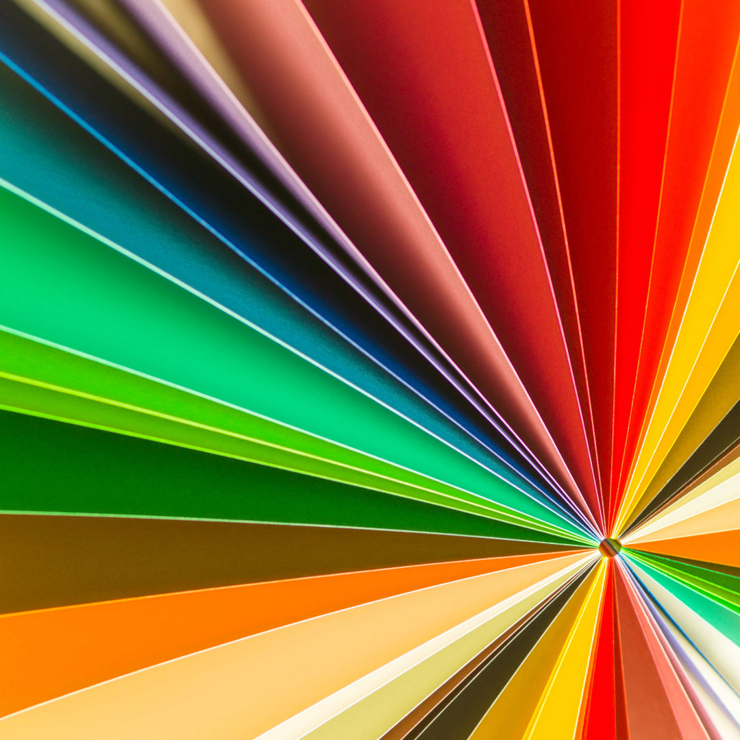 Folded color swatches formed into a circular design.