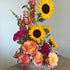 Sunflower and rose birthday arrangement with snapdragons and celosia by Pearson Floral Designs in Los Angeles.